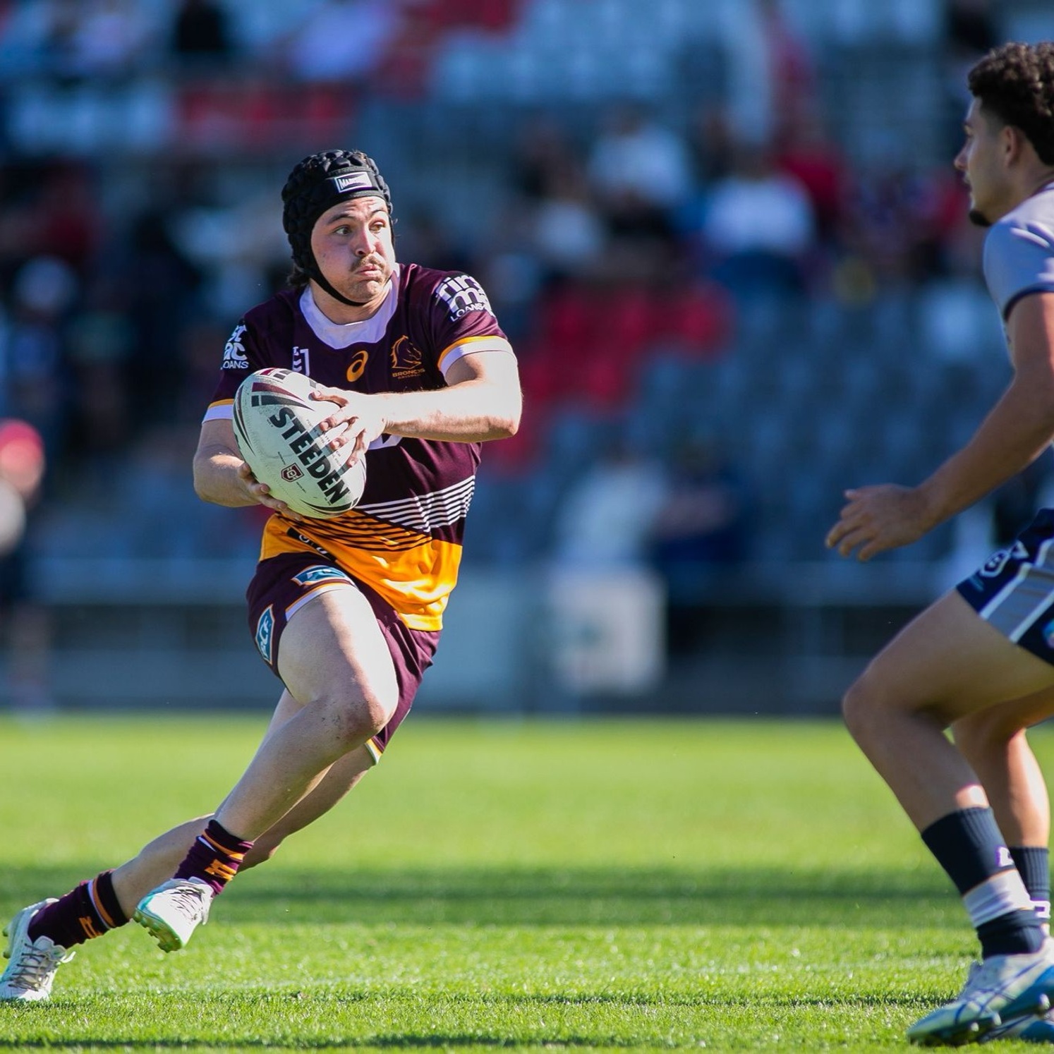 Bailey McConnell playing footy