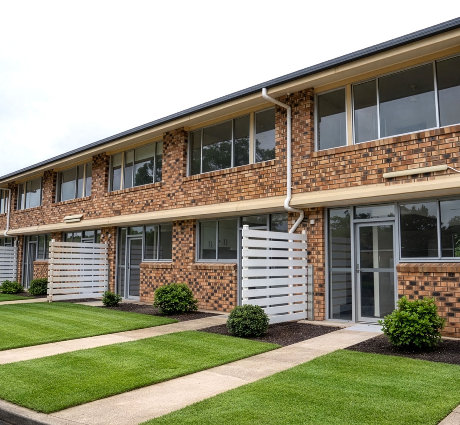 Exterior of brick building showing units for student accommodation - 1-1 scale