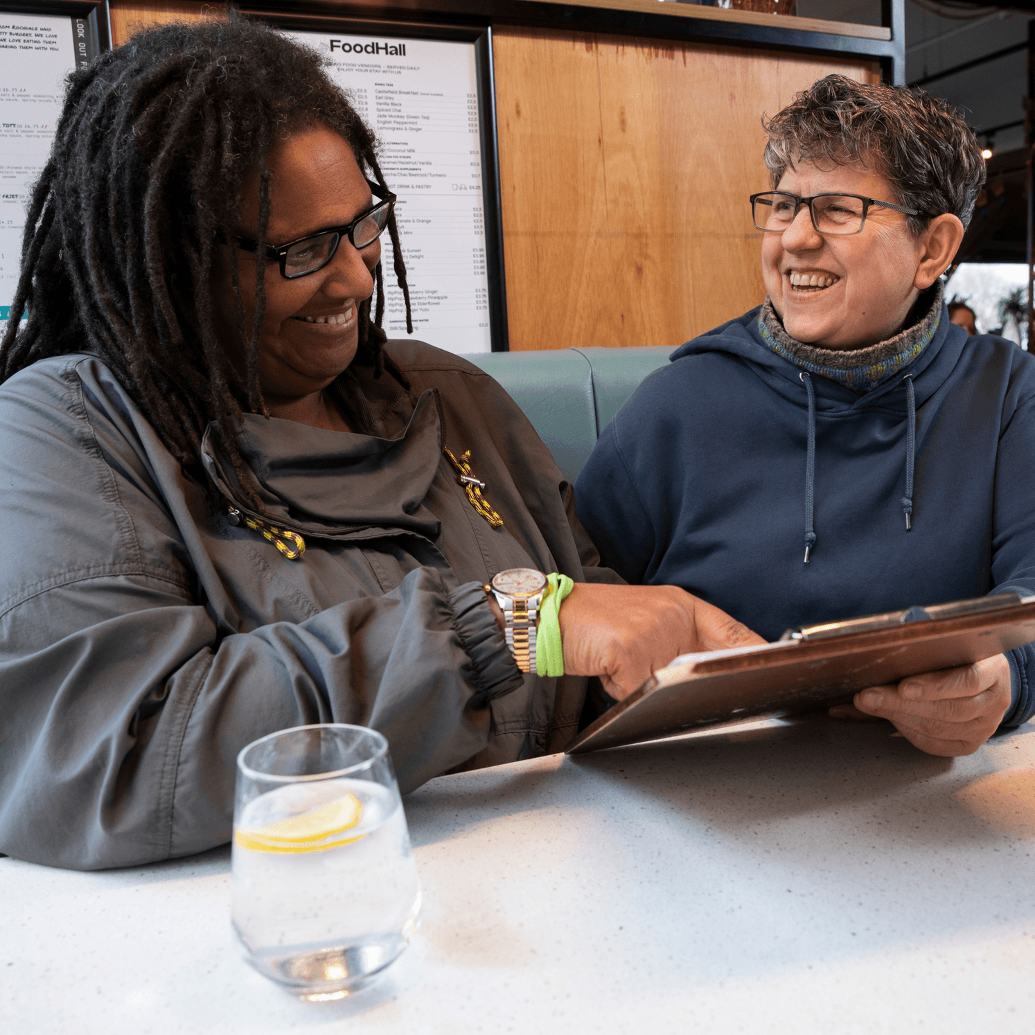 Two aged care workers together