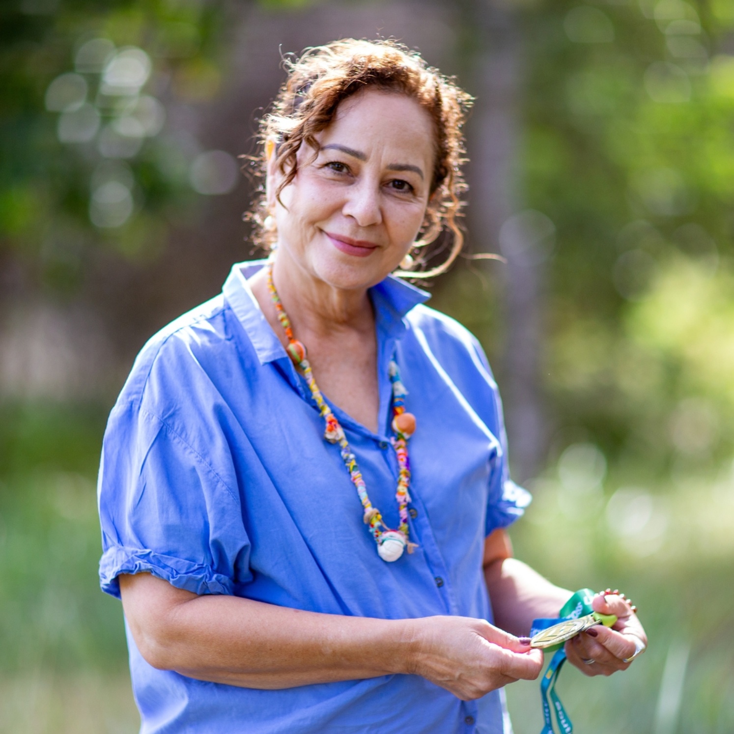 Nicole Tujague PhD holds her Chancellor's Medal