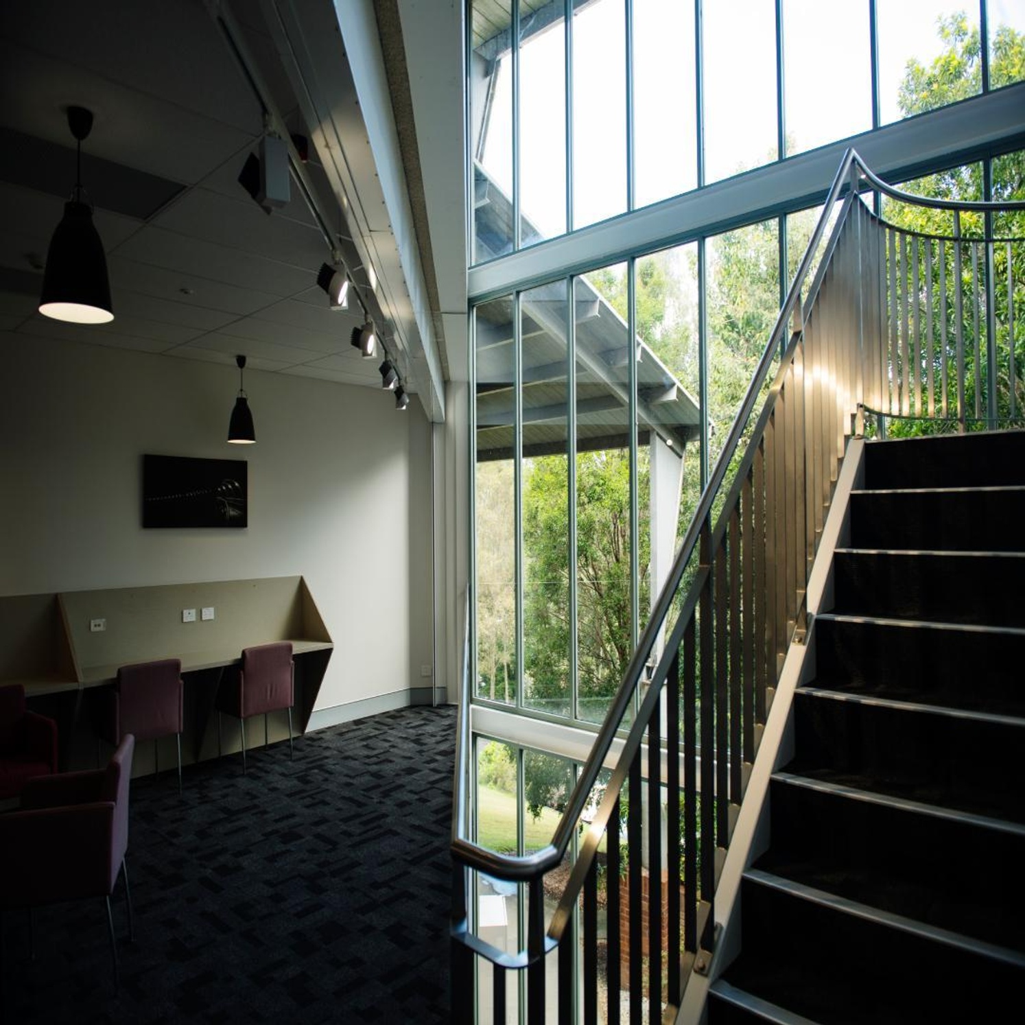 Looking through building to stairwell and study space