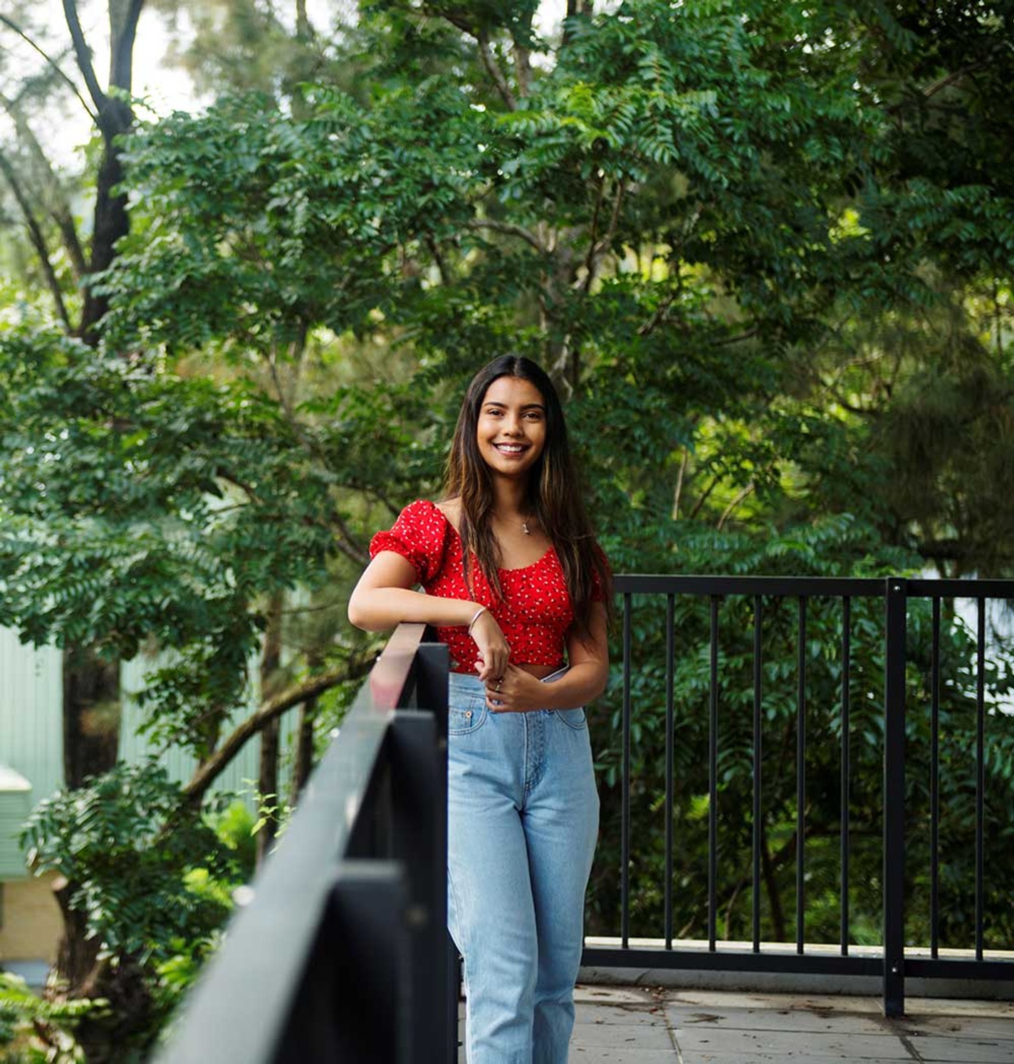 Rachel Goddard, music student standing on Lismore SCU Library balcony
