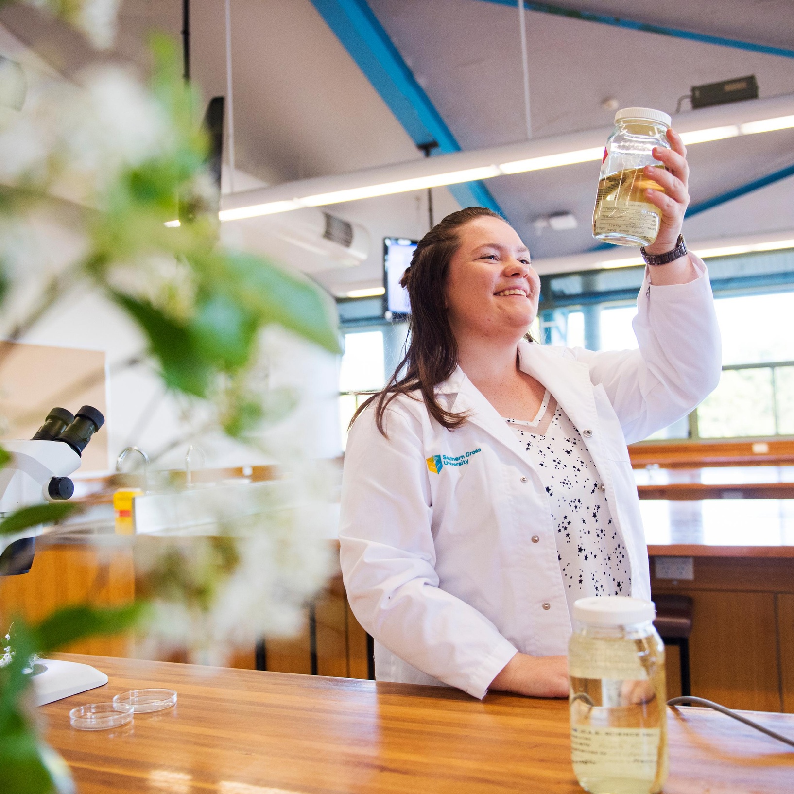 Female student in lab coat