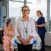 woman facing camera sitting