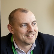 A man looks away from the camera to the right
