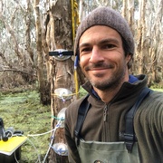 Dr Luke Jeffrey conducting research in paperbark forest