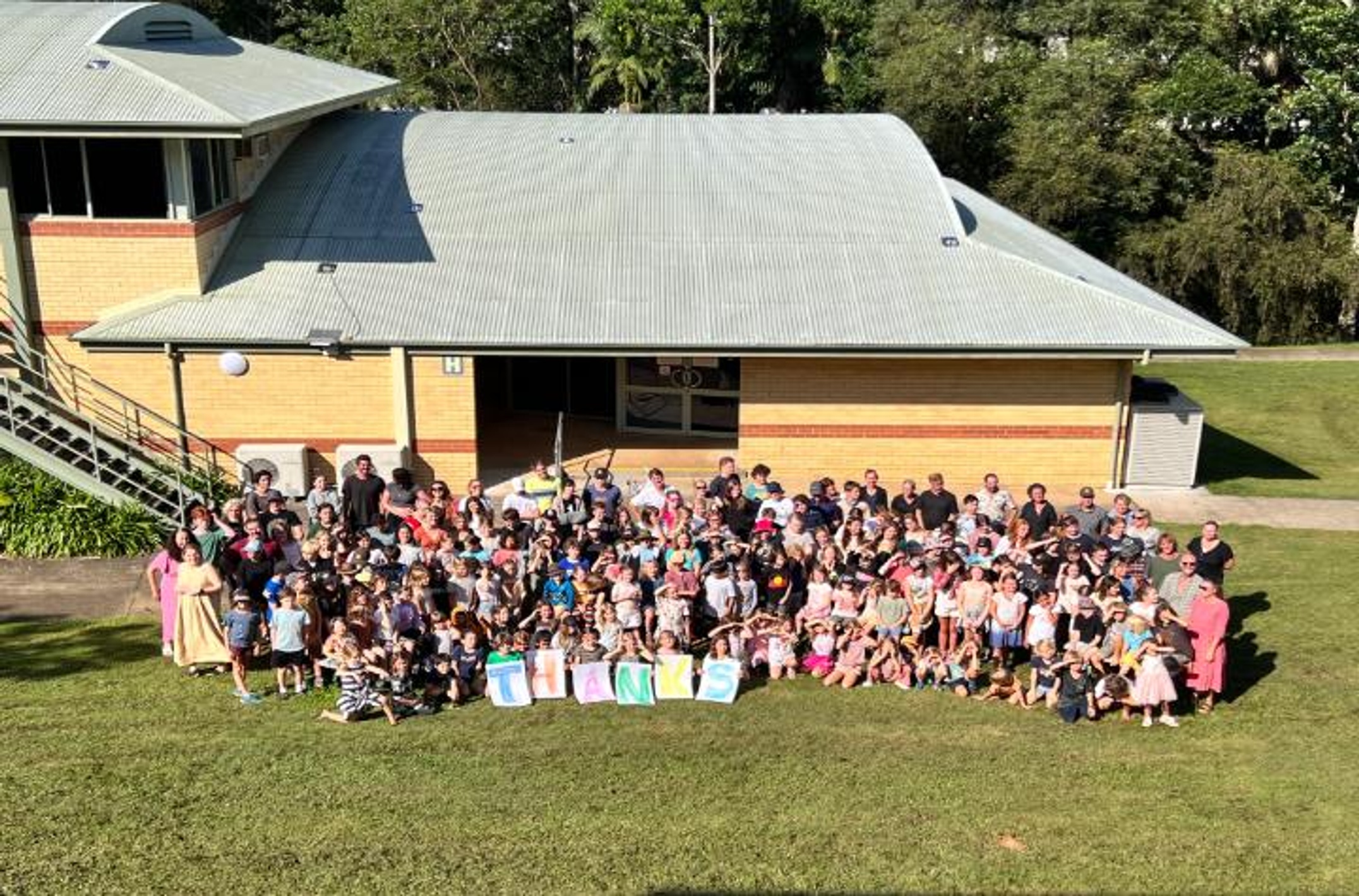 group of students outside building
