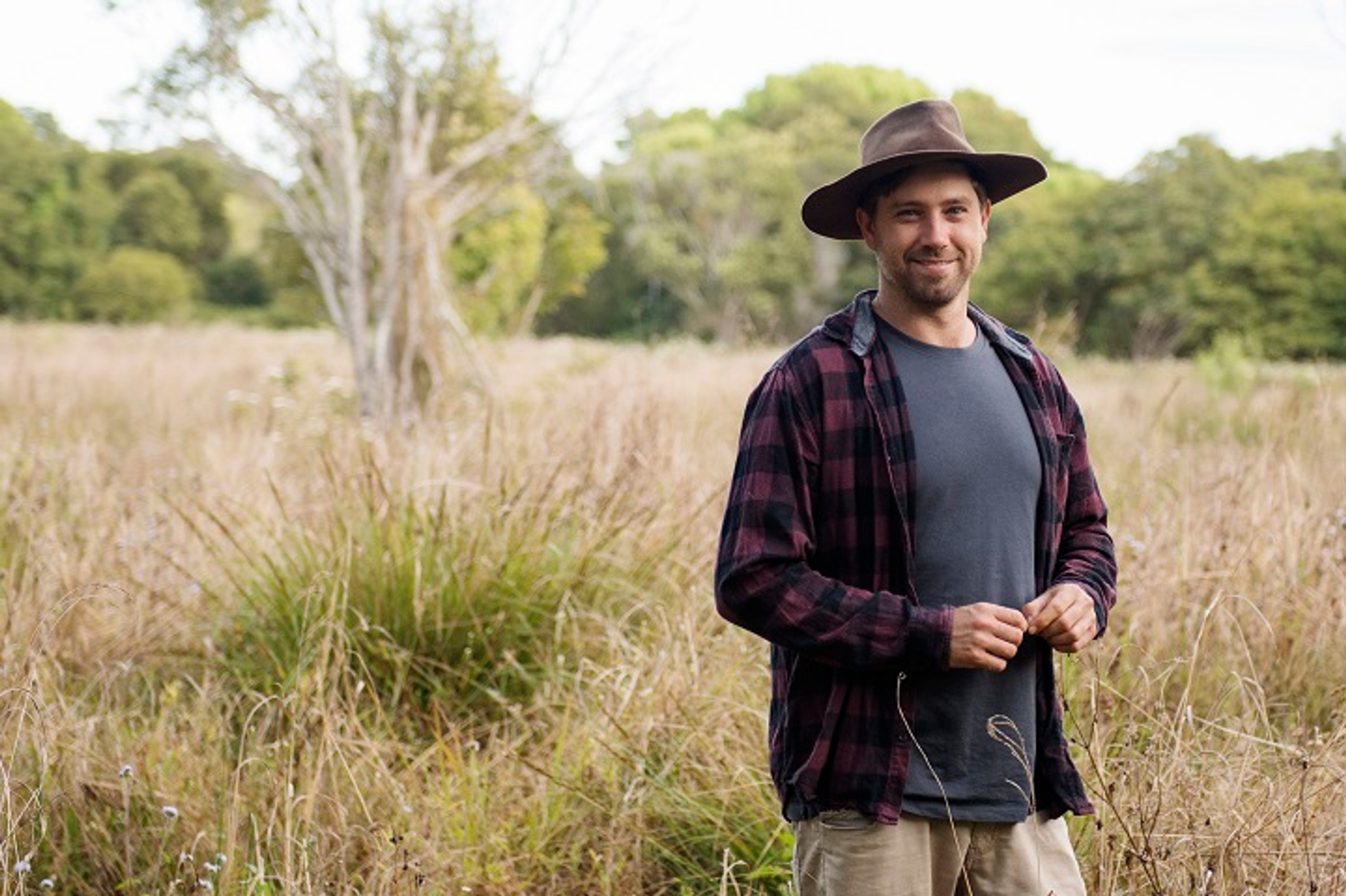A man stands in a field