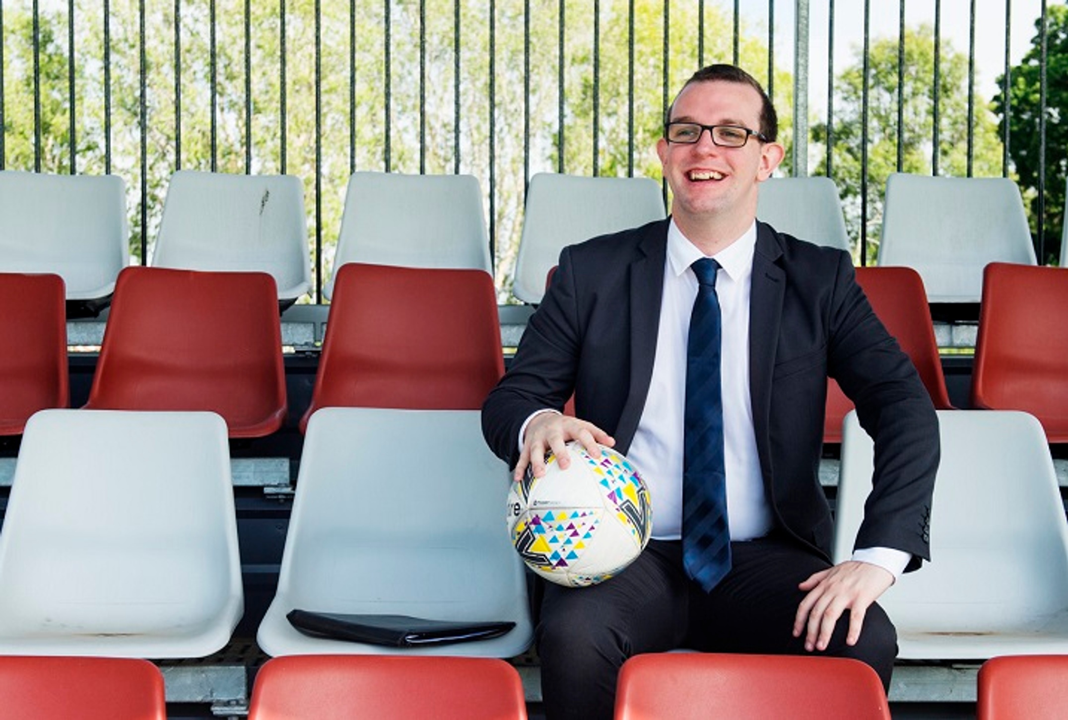Man in football stands
