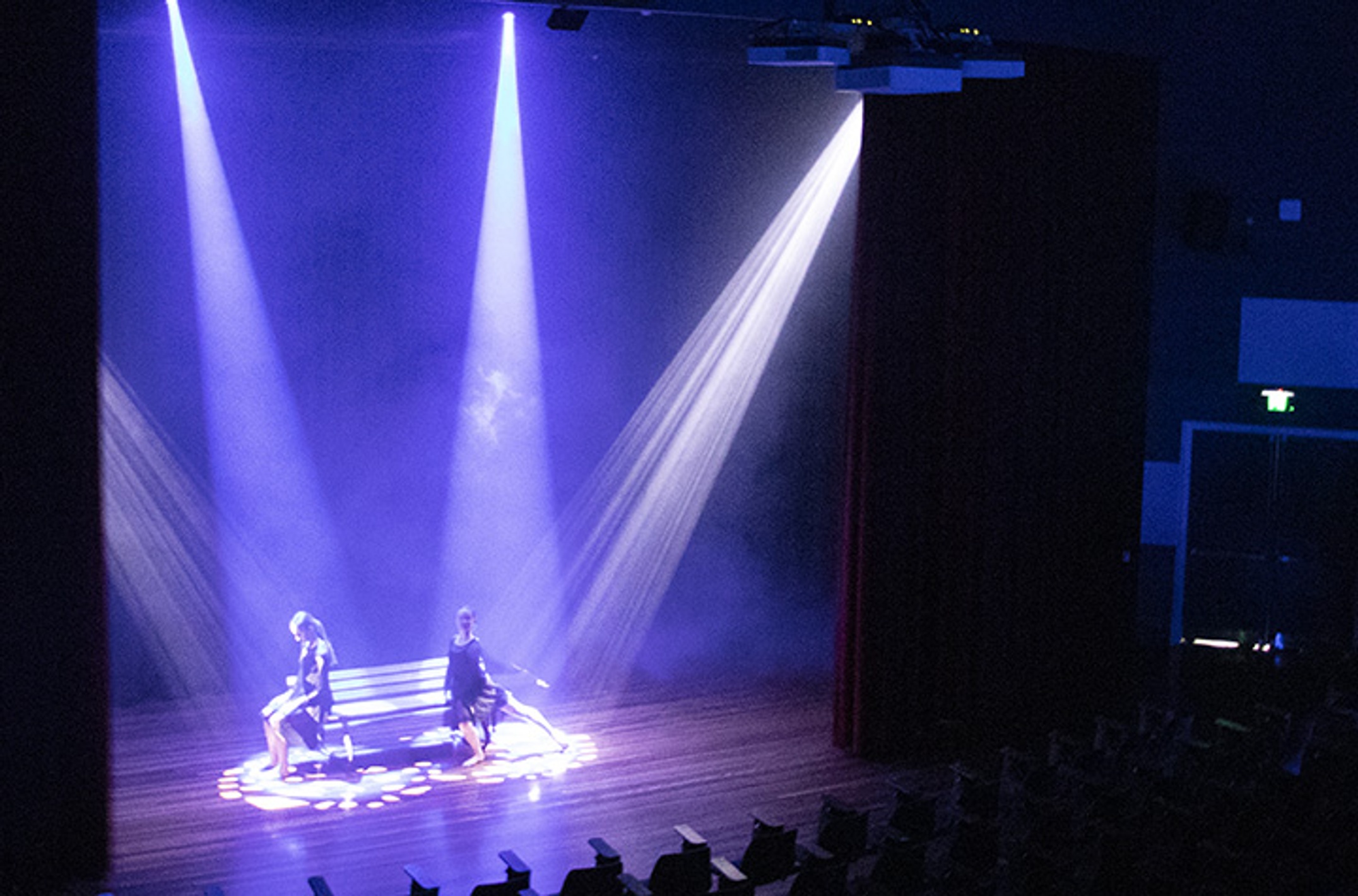 performers on stage at Coffs Harbour D Block lecture theatre