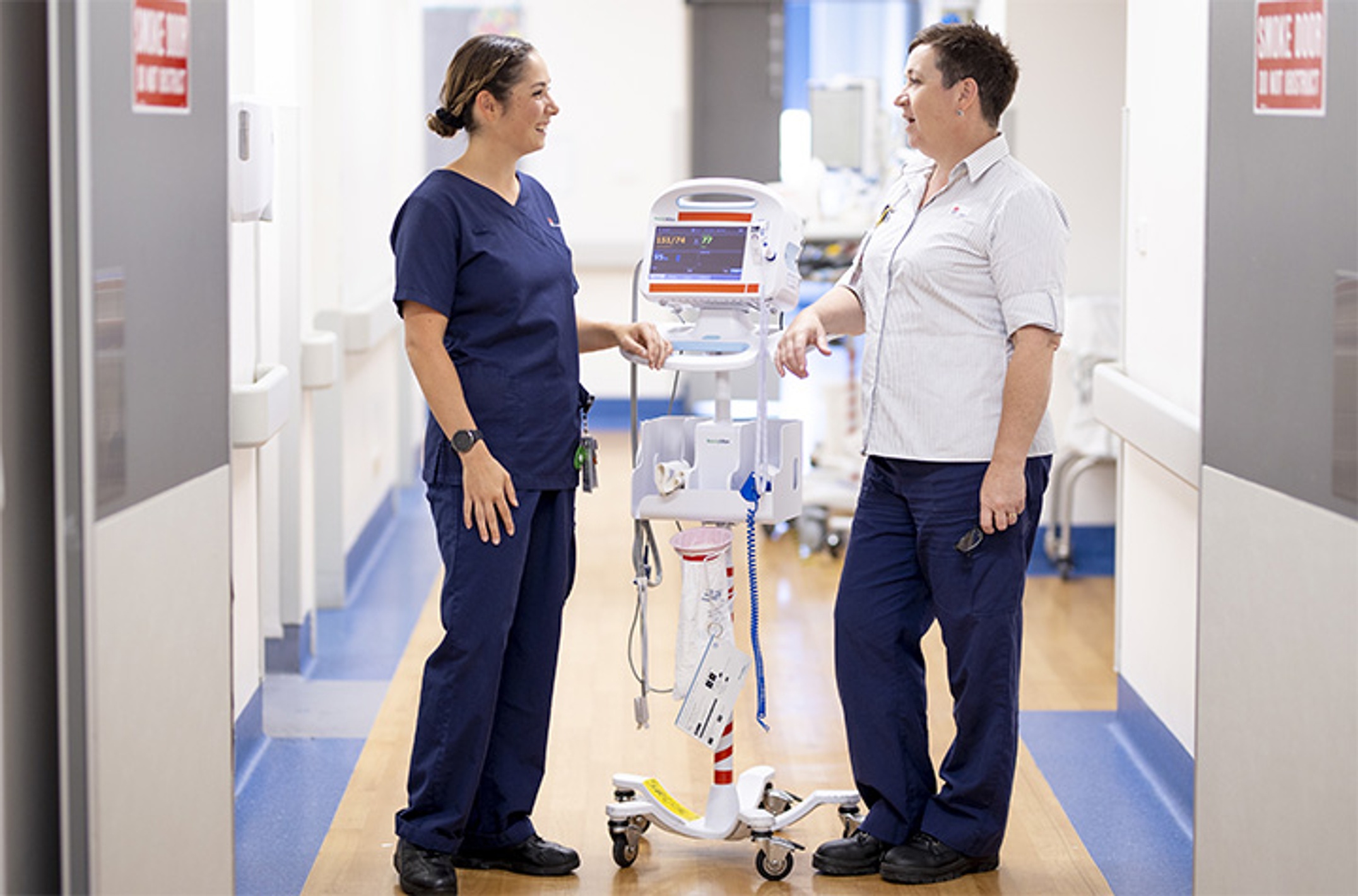 Graduate nurse Sophie Longworth (left) on duty