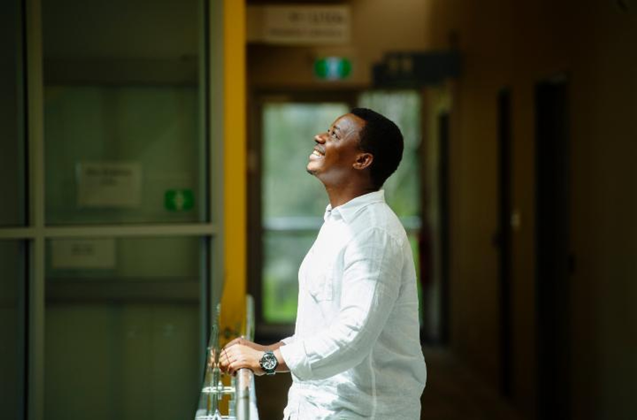Dieudonne Ininahazwe psychology graduate on campus at Coffs Harbour