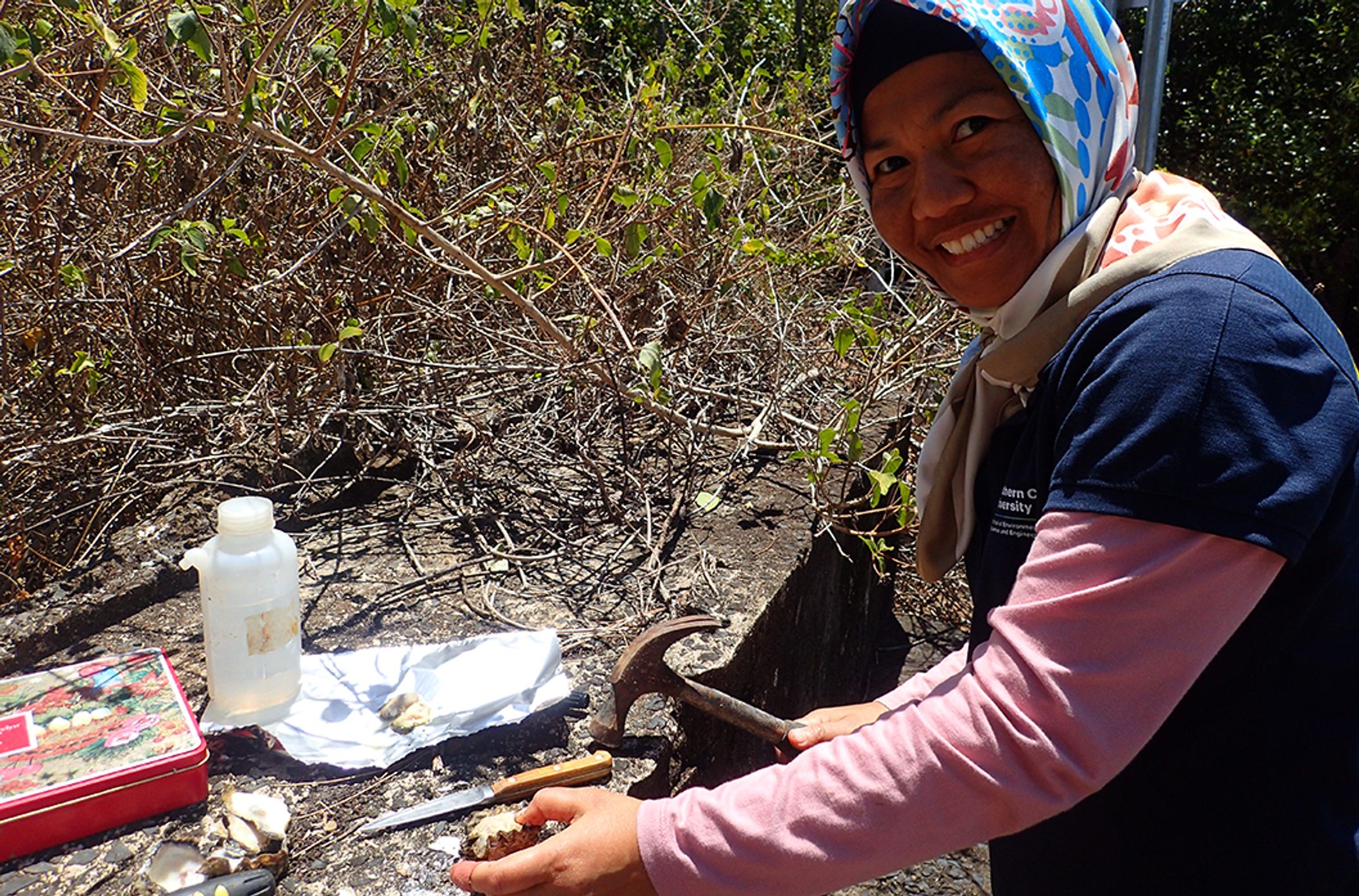 PhD researcher Endang Jamal with Richmond River oysters