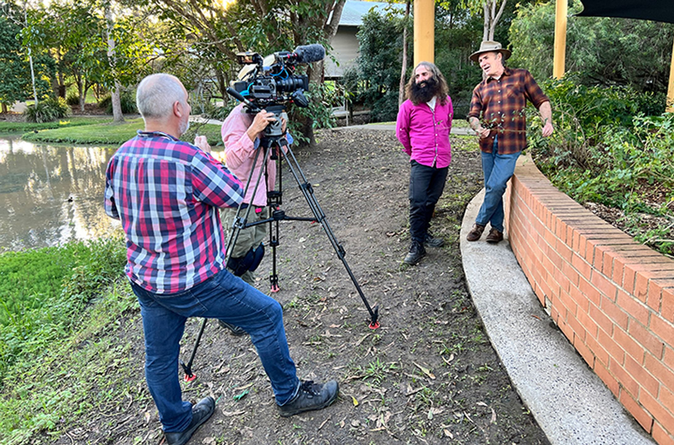 Behind the scenes filming a television show in a garden