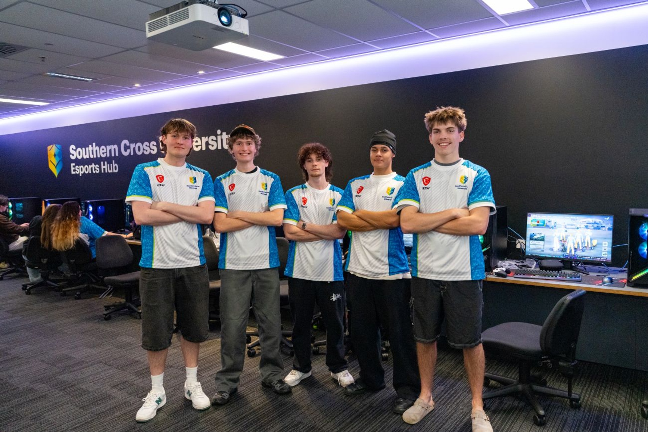 Five boys in esport jerseys at esports hub launch Gold Coast campus