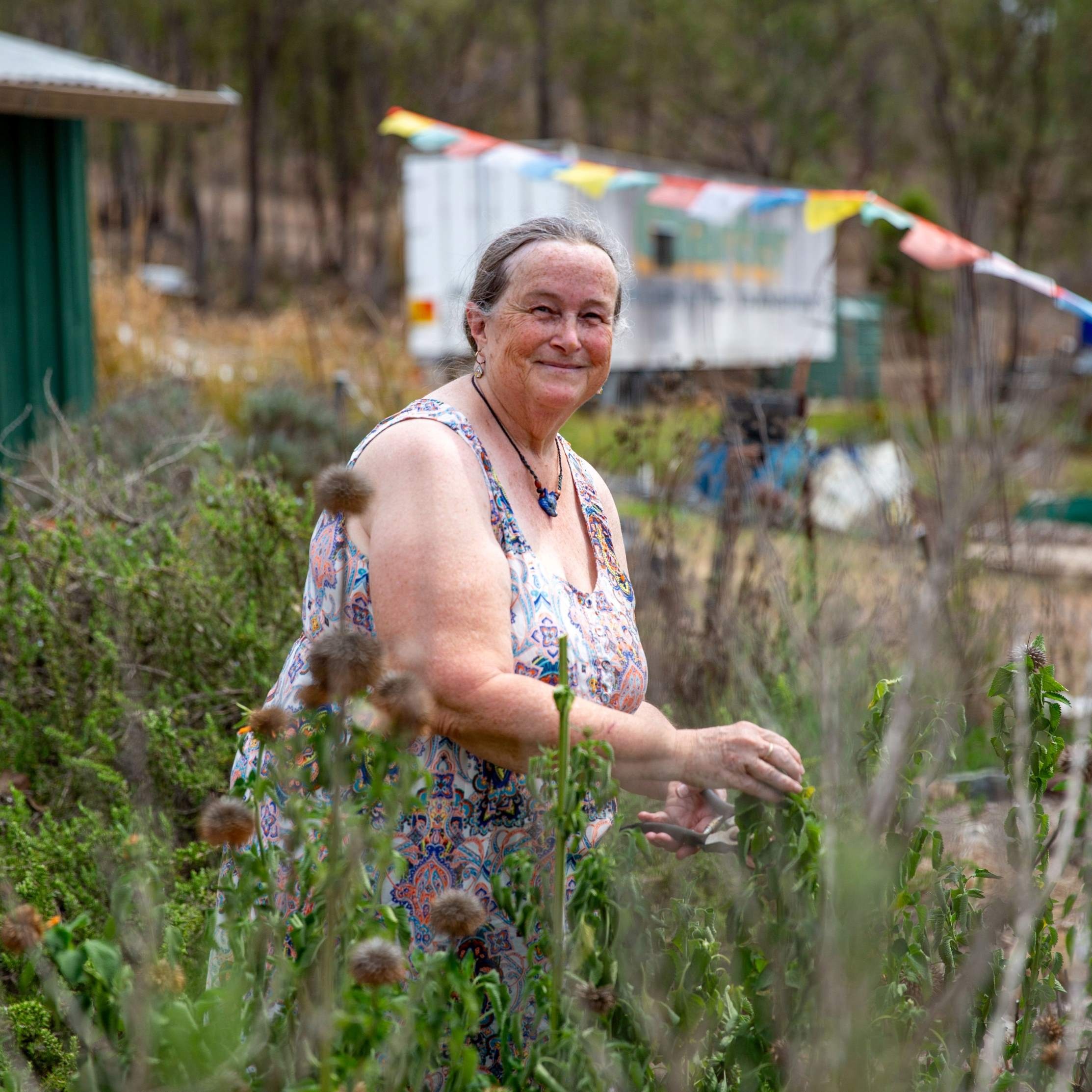 Woman in a herb garden