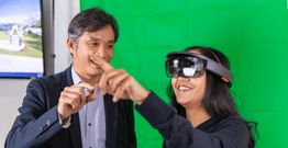 Two people using VR goggles