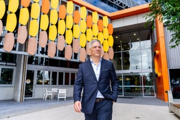 Dr Lewes Peddell walking through our Gold Coast Campus