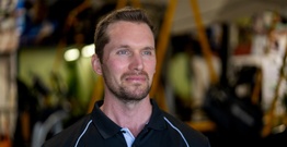 Headshot of man looking off camera