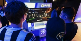 Boys playing playstation 5 game