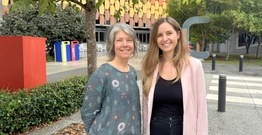 Dr Louise Whitaker & Jessica Jeffreys standing outside SCU Gold Coast campus