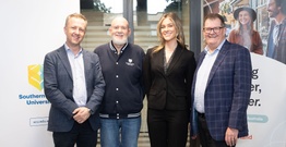 Ben Roche, Mike Ewing, Isabella Dowd and John Williams smiling at camera