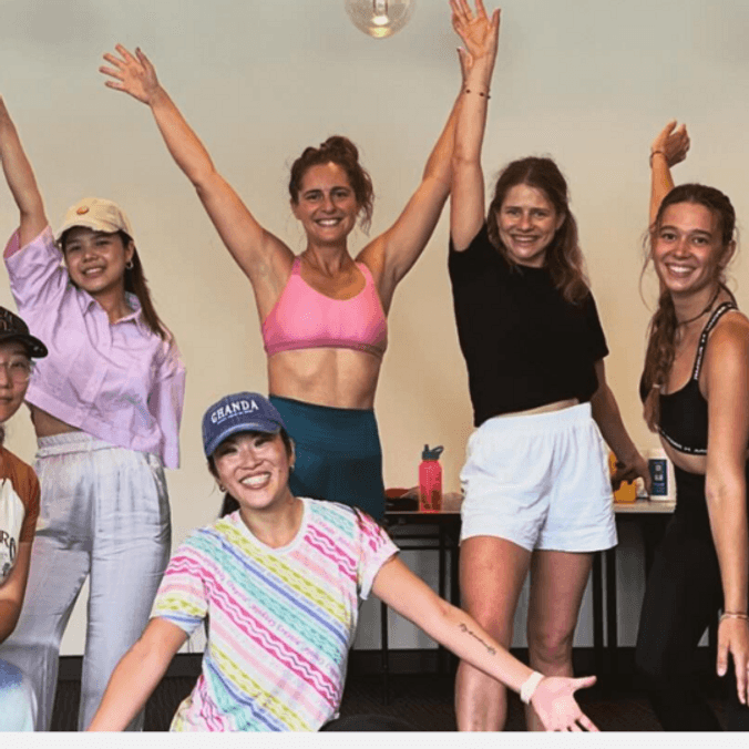 Zumba class looking happy and excited