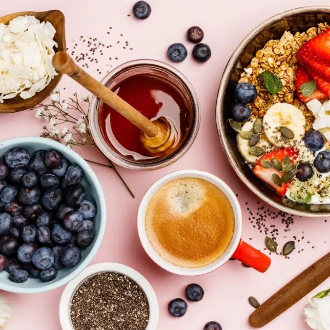 Breakfast foods on display with coffee