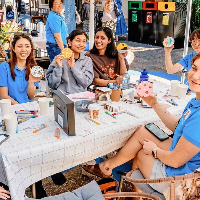Students painting at a LEXSA workshop outdoors