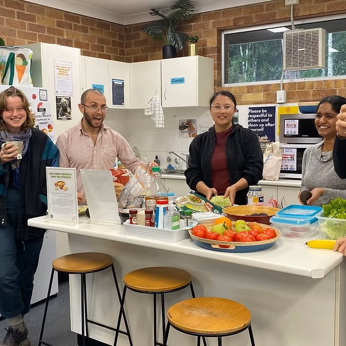 Students in common room for free lunch wraps from LEXSA