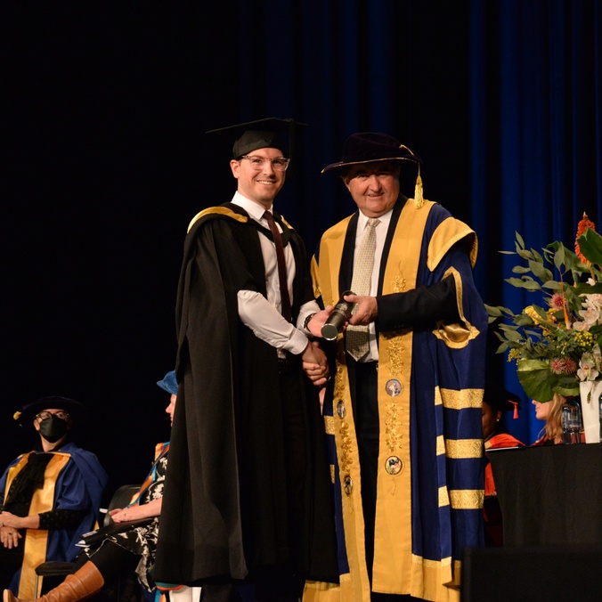 Andrew Nichol receives his Master of Business Administration