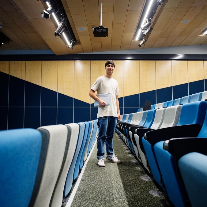 Davi Algranti standing in a lecture theatre