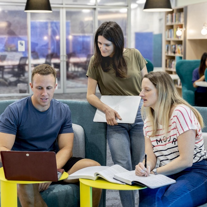 students in library