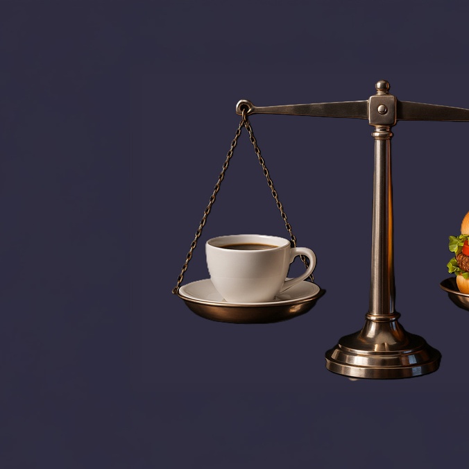 Lunch Law Talks  - image shows a set of scales with coffee cup and hamburger balanced either side