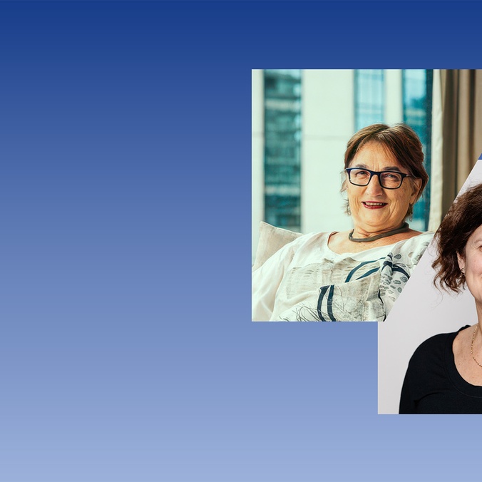 Two women smiling at camera