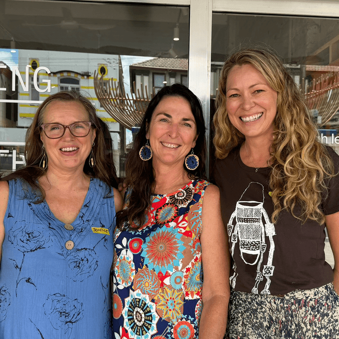 Three women smiling at camera outside the Living Lab Northern Rivers
