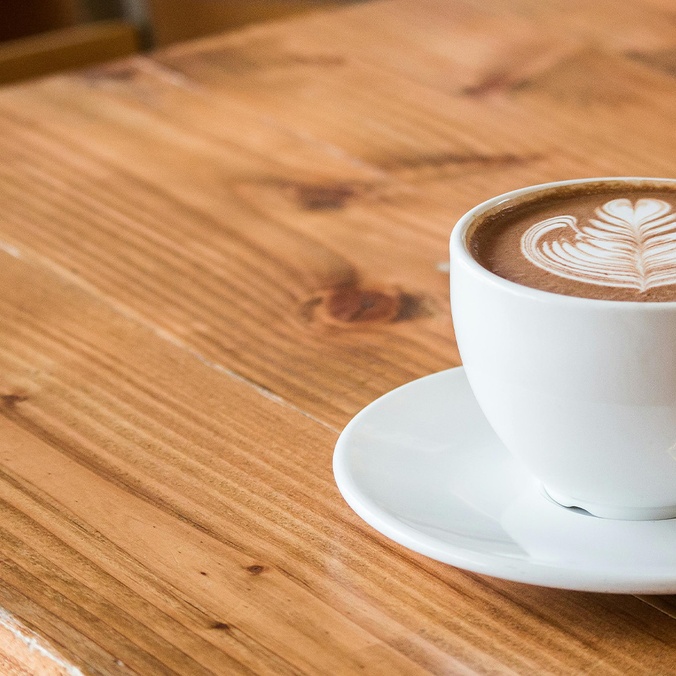 A cup of coffee on a table