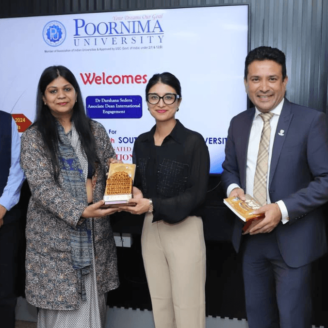 Group of people holding an award