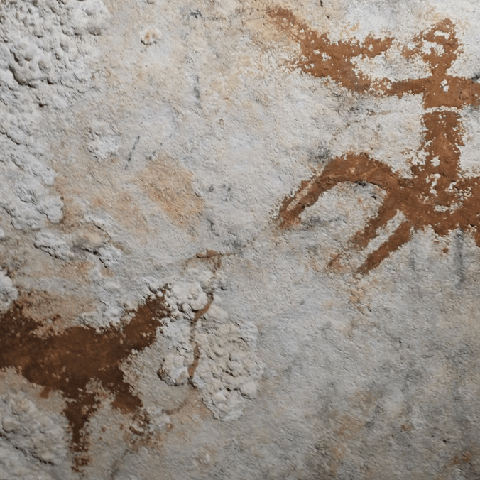 Image of 67,800 year old hand stencil found on the island of Sulawesi