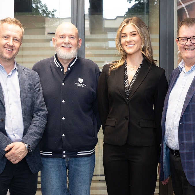 Ben Roche, Mike Ewing, Isabella Dowd and John Williams smiling at camera