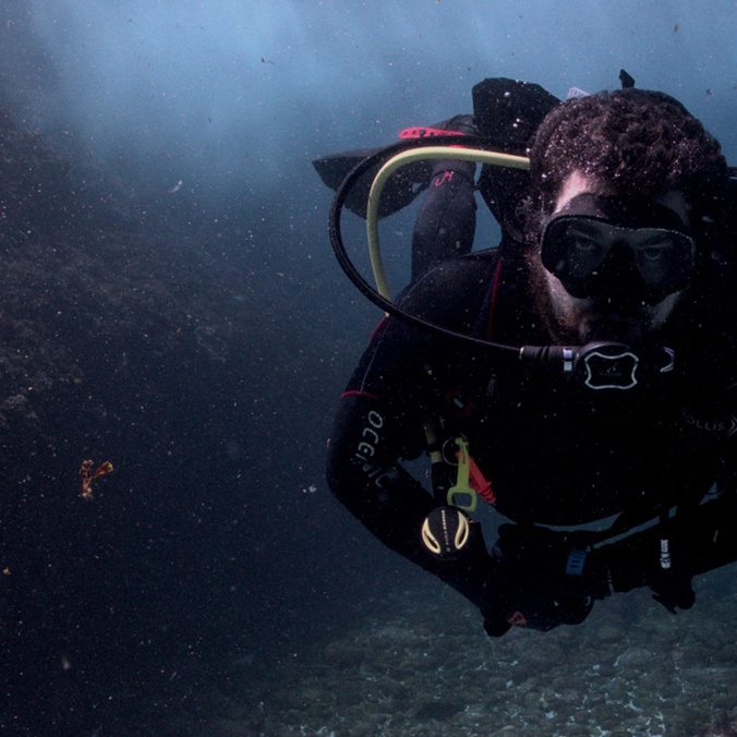 Jordan ivy in scuba gear underwater on the great barrier reef