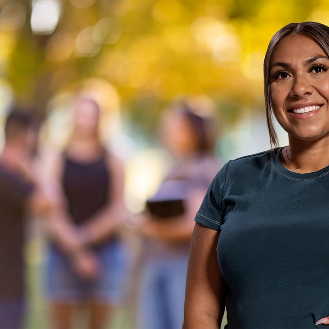 Student smiling on campus