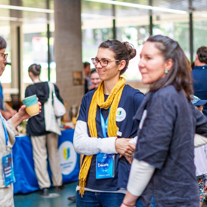 People talking at Southern Cross University Open Day in the Northern Rivers