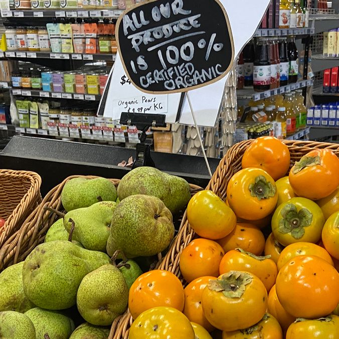 Fruit and vegetables marked Certified Organic Produce in a shop