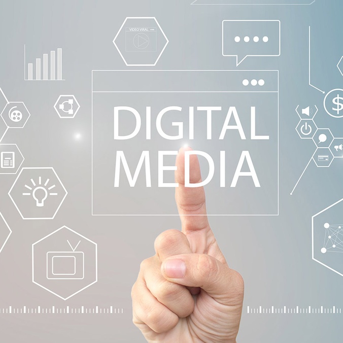 a finger pointing to touch digital media