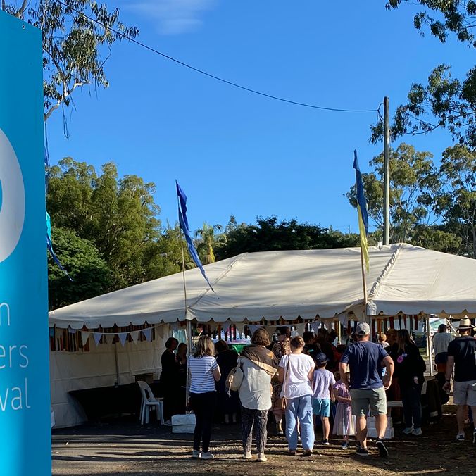 Crowd walking through the 2023 Byron Writers Festival entrance