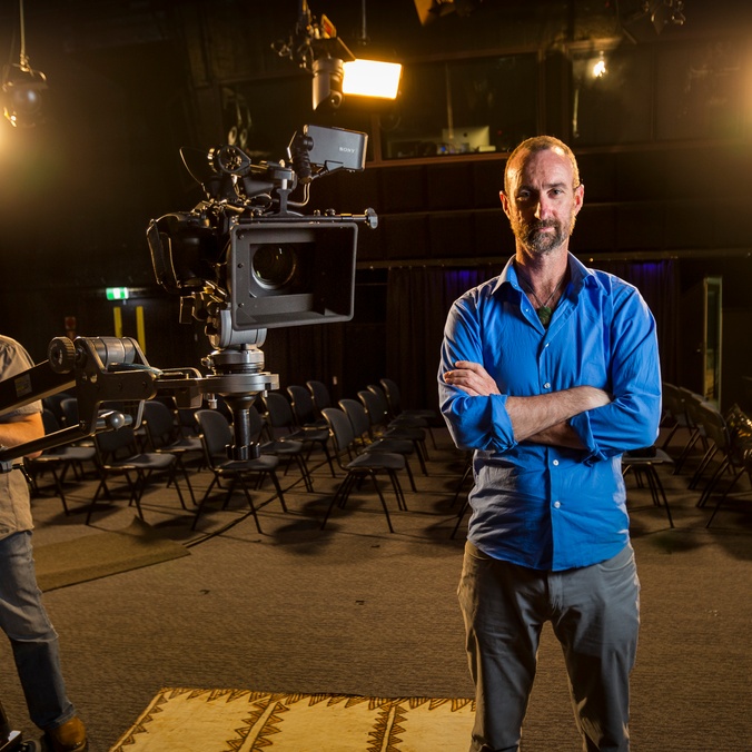 Academic standing in camera studio