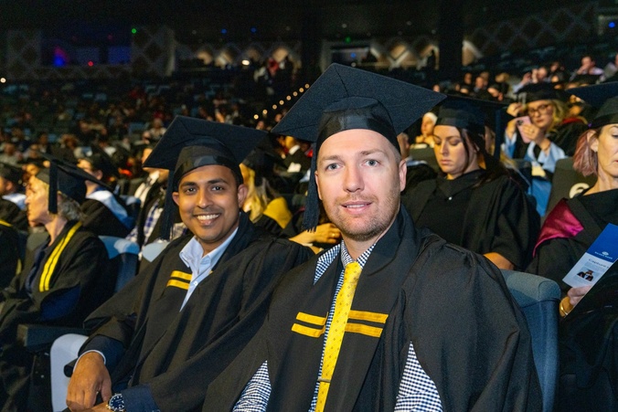 Students sitting at SCU Sydney Gradaution Ceremony