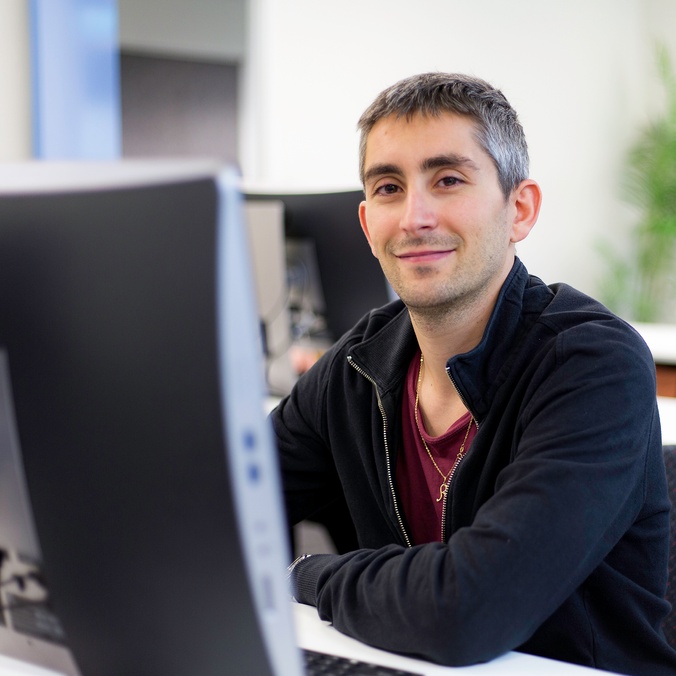 student at desktop computer