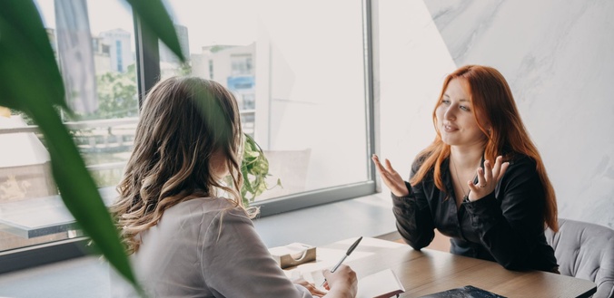 A student speaking to a counsellor